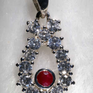 Unheated Mogok Burmese Ruby set in natural white zircon and 9k white gold rhodium plated