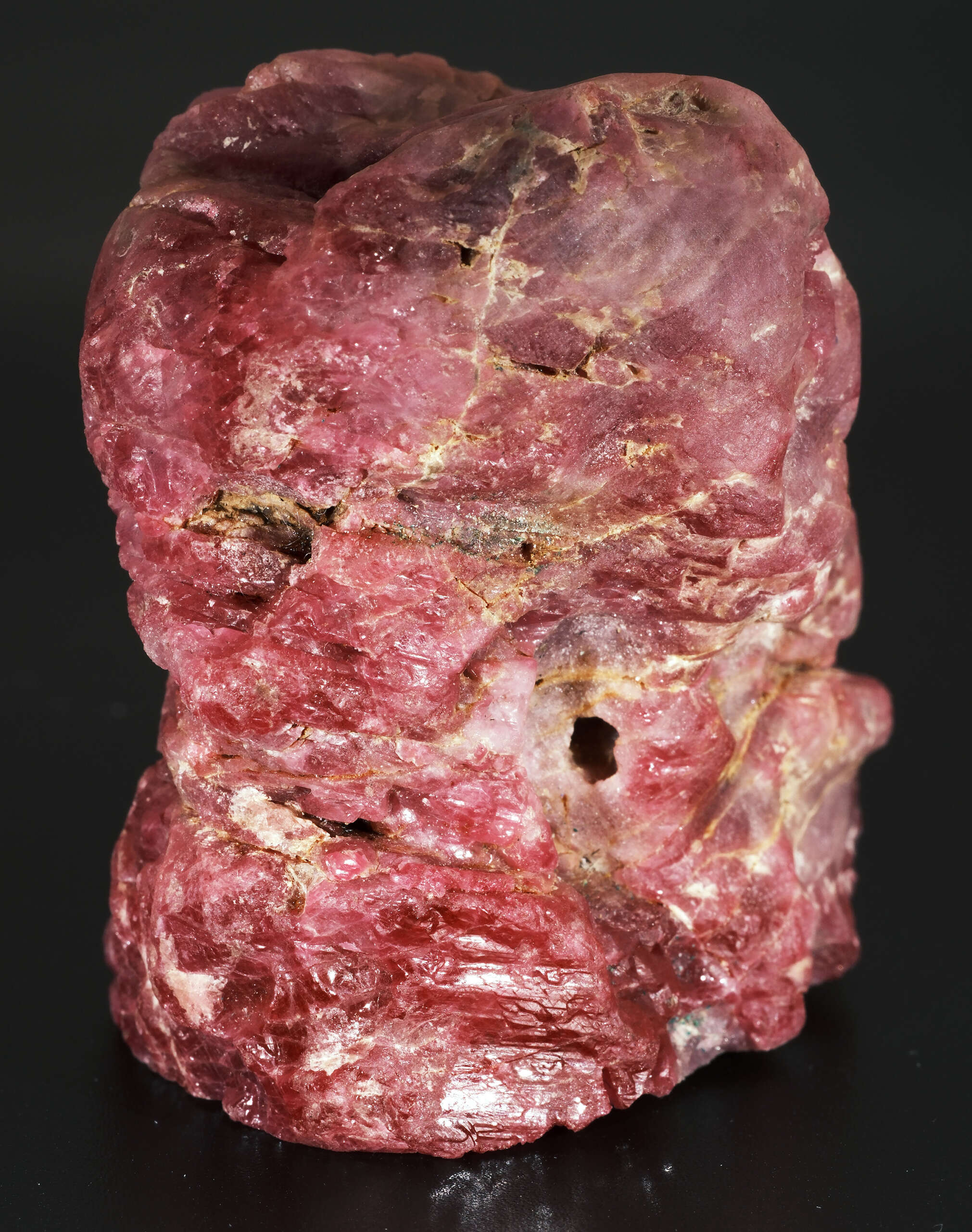 Large rough Burmese Mogôk ruby specimen weighing 178.8 grams with natural crystal surfaces
