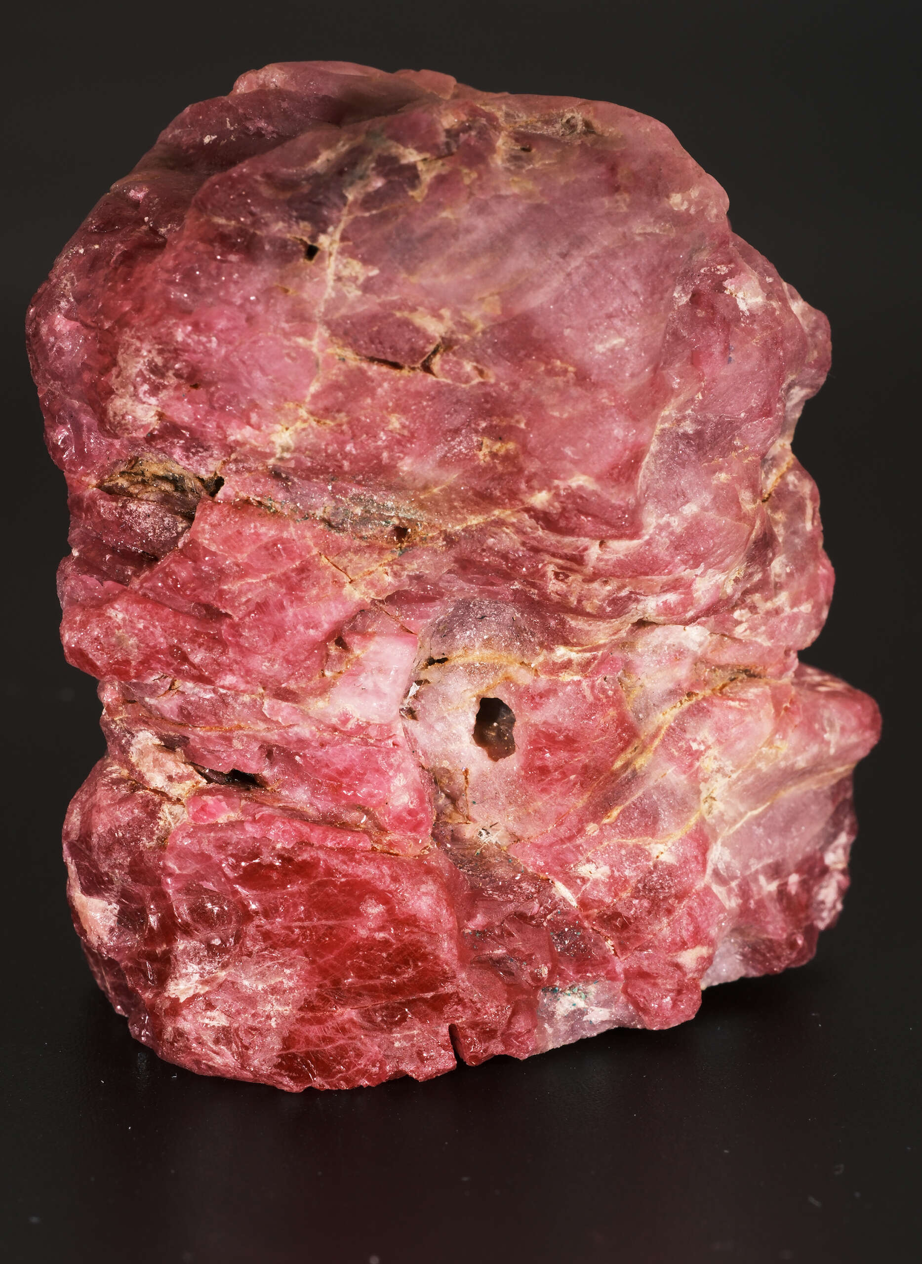 Large rough Burmese Mogôk ruby specimen weighing 178.8 grams with natural crystal surfaces