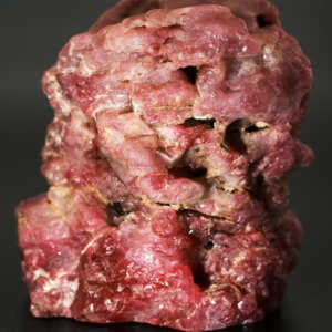 Large rough Burmese Mogôk ruby specimen weighing 178.8 grams with natural crystal surfaces